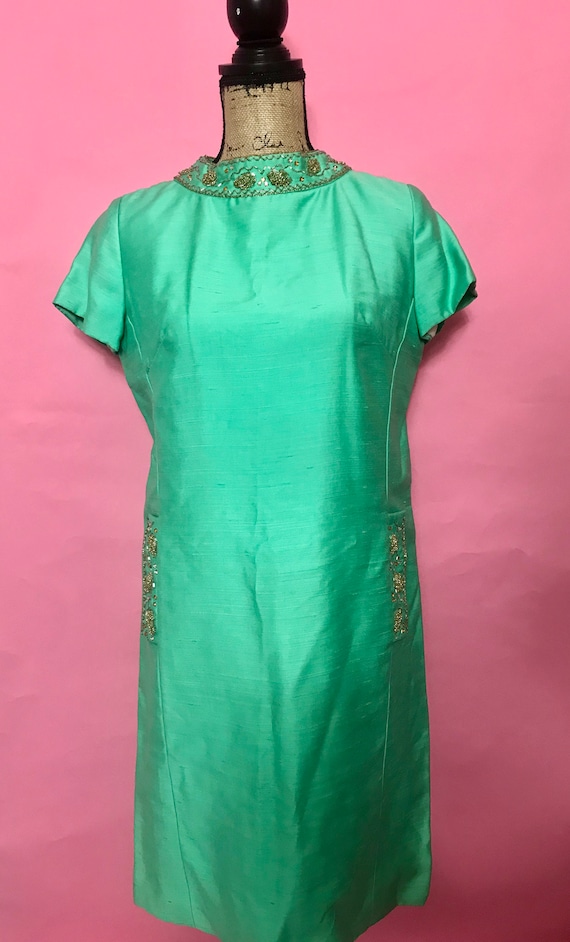 green brocade dress