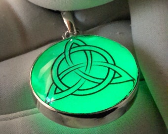 Glow in dark amulet. Sterling silver and glass double- sided pendant “Triquetra".