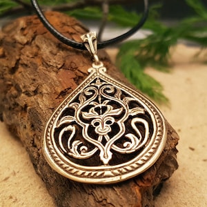 Open work pendant Fertility .  Slavic talisman. Pagan amulet.