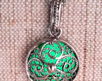 Glow in dark amulet. Slavic pendant Solstice. With filigree ornament