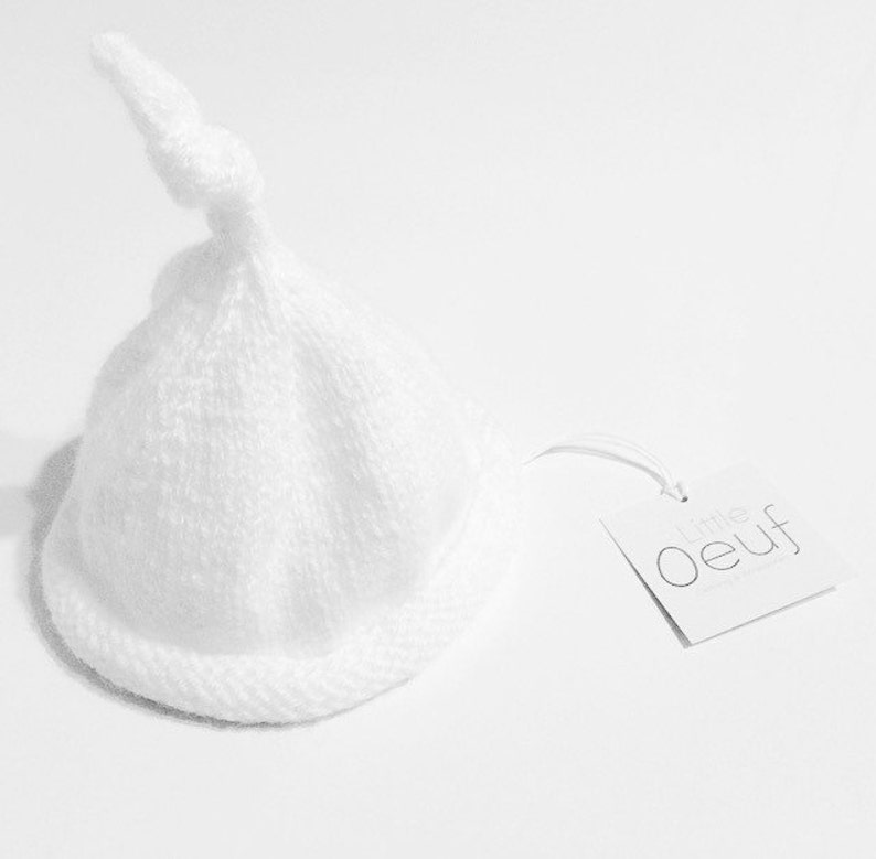 white cotton newborn hat