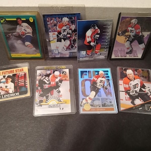 33 carte da collezione di hockey di Eric Lindros - Leaf-Pinnacle-Upper Deck-Topps - (NBPE#2614)