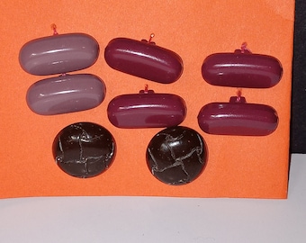 8 Vintage Plastic Buttons - (NBPE#2462E)