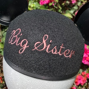 Cappello con orecchie da Topolino della sorella maggiore