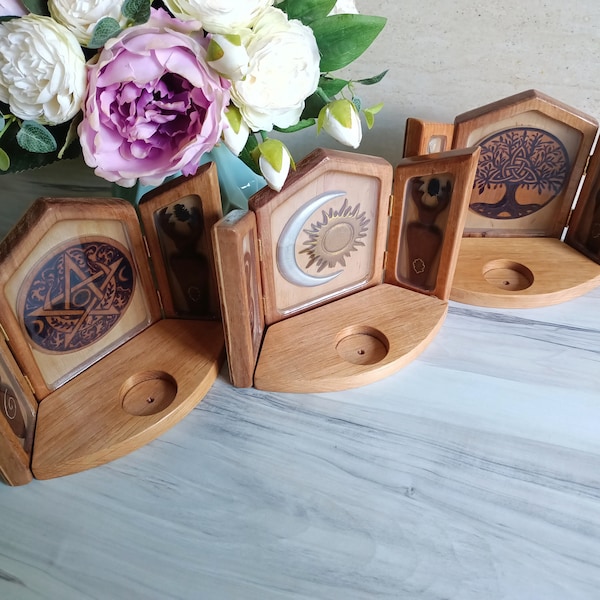 Folding small altar shine of Wiccan pagan ancient god and goddess, moon and sun or pentagram, triptych with candleholder
