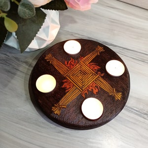 Imbolc / Candlemas altar pentacle with candleholders and Brigid's / Brigit's cross