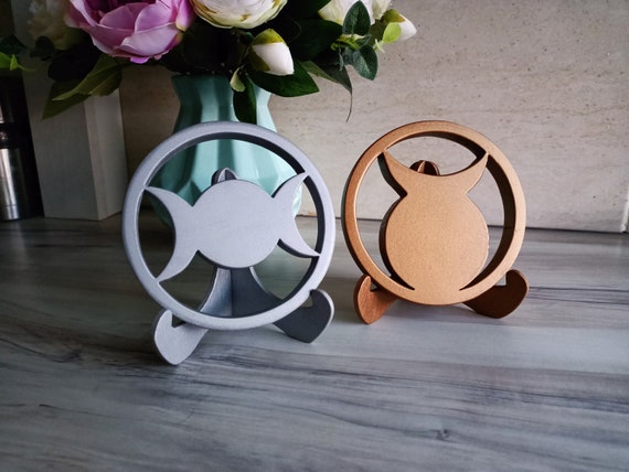 Set of wooden symbols of wiccan Goddess and God