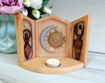 Folding small altar shine of wiccan pagan ancient god and goddess, moon and sun or pentagram, triptych with candleholder