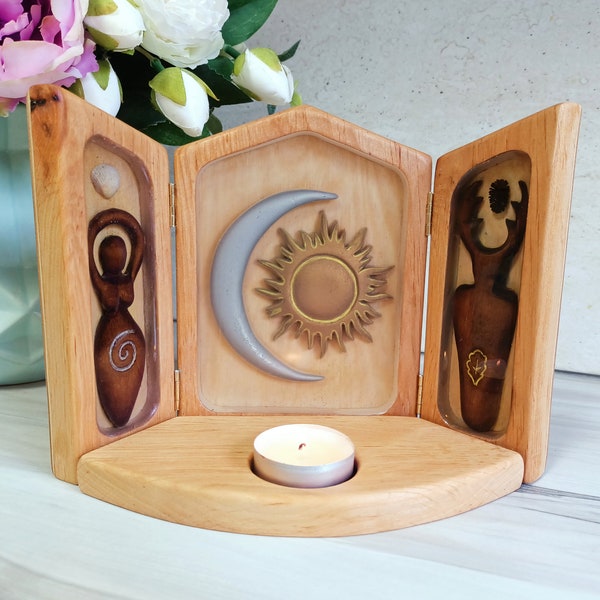 Folding small altar shine of wiccan pagan ancient god and goddess, moon and sun or pentagram, triptych with candleholder