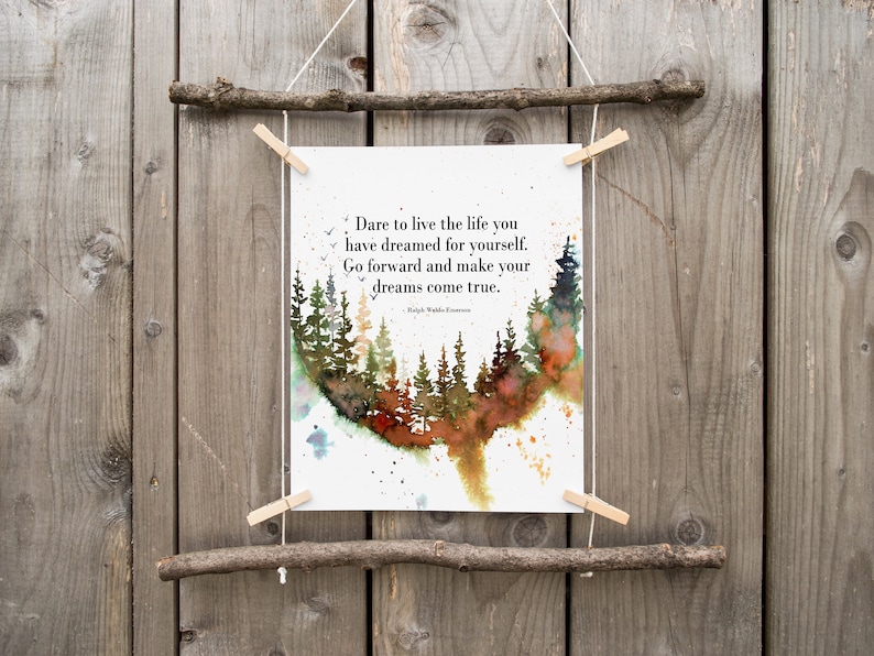 May include: A watercolor print with a quote by Ralph Waldo Emerson: "Dare to live the life you have dreamed for yourself. Go forward and make your dreams come true."
