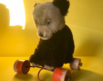steiff teddy bear on wheels