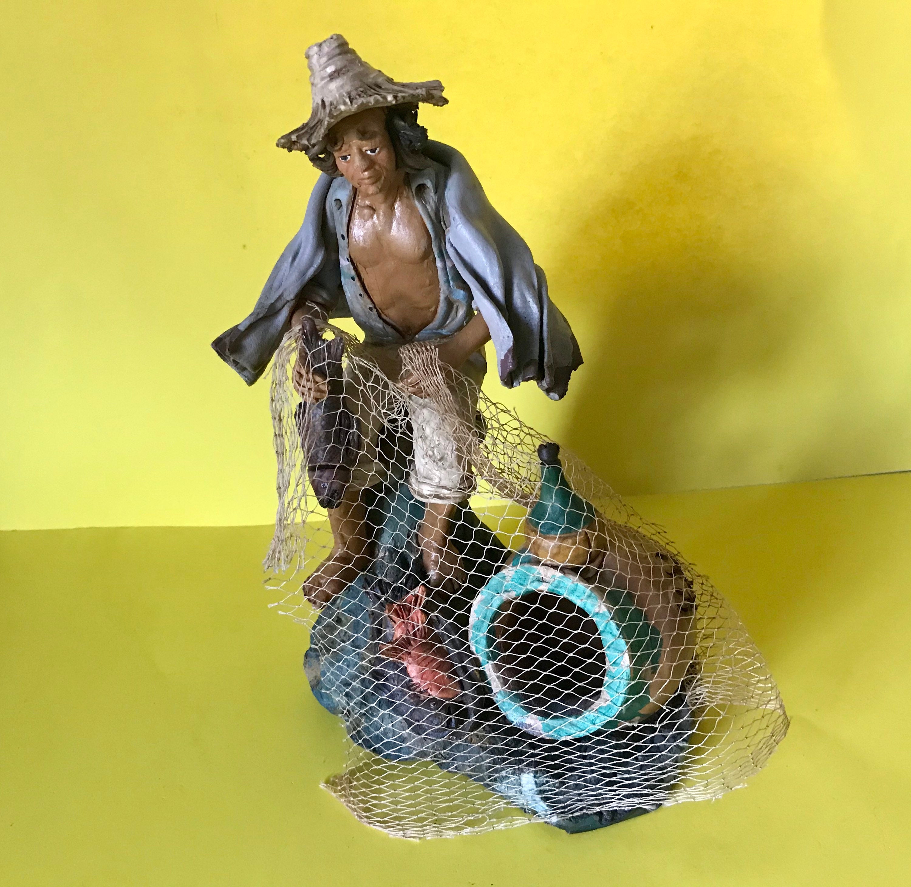 vintage-folk-art-pottery-fisherman-with-a-gillnet-figurine-etsy