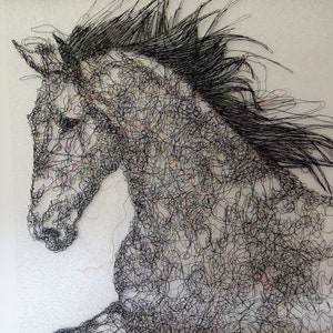 May include: A black and white wire sculpture of a horse rearing up on its hind legs. The horse is made of many small, intertwined wires that create a detailed and intricate design.