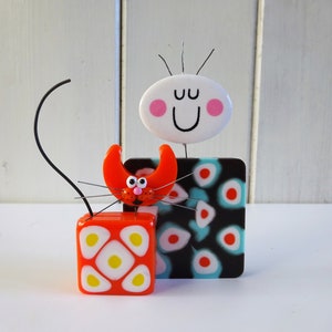 Whimsical Male Figurine Sculpture with Cat: Colorful Resin Artwork