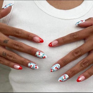 Cherries and stars press on nails-luxury nails-almond nails-nail art-faux nails-gel x nails-glue on nails-aesthetic nails-cherry nails-stars