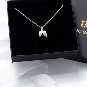 Sterling silver angel wing necklace in Bijou Betty gift box.