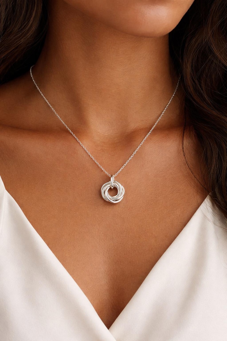 Model wearing a 50th birthday 5 ring necklace.