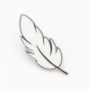 white enamel feather pin badge.