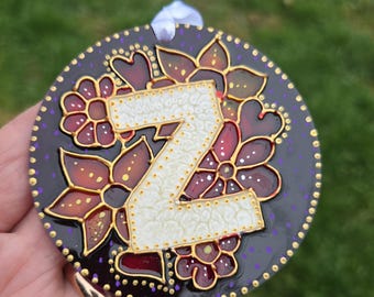 Atrapasol acrílico con la letra Z