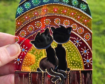 Atrapasueños de cristal con forma de gatos arcoíris