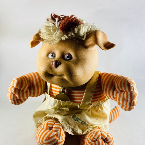 Cabbage Patch Koosa 1983 Vintage soft sculptured puppy doll with two-tone tuft of hair and original smocked sundress Xavier Roberts CPK