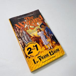 Wizard of Oz vintage paperback book by L Frank Baum circa 1988 Retro yellow decor stocking stuffer