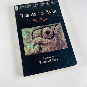 Art of War by Sun Tzu Vintage paperback book of the ancient Chinese military treatise by Master Sun Sunzi Black bookshelf decor Philosophy