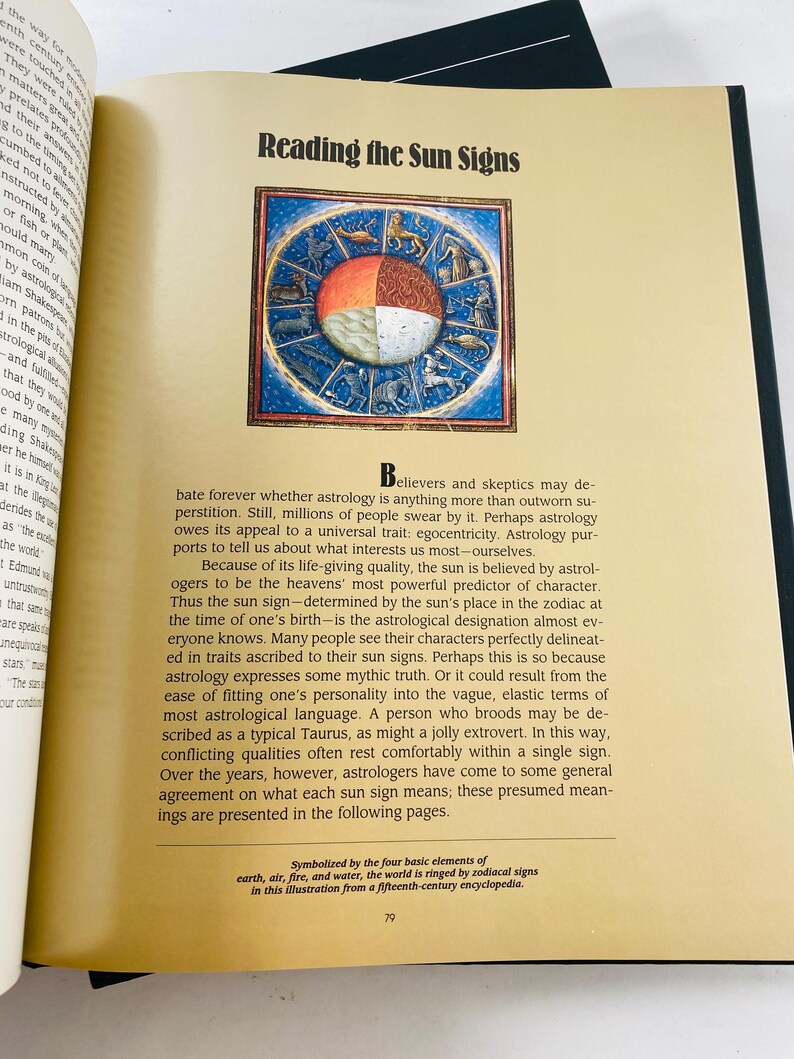 May include: Open book page with the title "Reading the Sun Signs" above a colorful illustration of the zodiac. The illustration is a circle divided into sections with astrological symbols and figures. Text discusses astrology and sun signs.