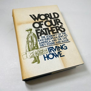 May include: A book titled "World of Our Fathers: The Journey of the East European Jews to America and the Life They Found and Made" by Irving Howe. The cover features a black and white illustration of a man carrying luggage.