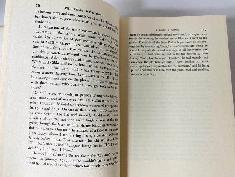 May include: Open book pages with printed text. The left page features the title "THE YEARS WITH BOSS" and paragraphs of text. The right page has the title "A DIME A DOZEN" and more text. The pages are off-white.