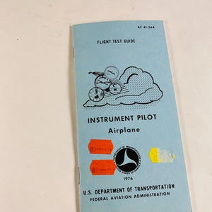 Guía de prueba de vuelo de piloto de instrumentos vintage de 1976 para navegación de aeronaves de aerolíneas FAA Departamento de Transporte de EE. UU. Aviación Federal