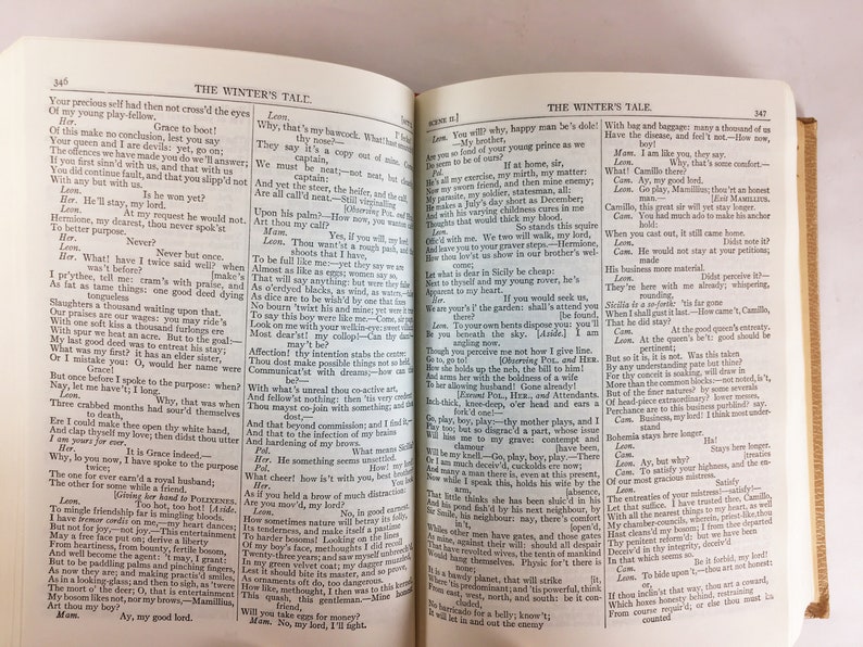May include: Open book with text from "The Winter's Tale" on aged paper. The pages are yellowed, and the text is in black. The book is open to a double-page spread, with text filling both sides.