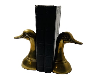 Mid-century brass pair of duck bookends circa 1950s Great gift for a library or office. Perfect for the sportsman! Elegant gold decor.