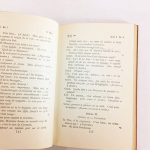 May include: A page from a French play, "Cyprien, de la Porcheraie." The text is in French and describes a scene where a character is being treated with hydrotherapy. The text mentions a zinc reservoir, a sonnette, and a glass of Madeira.