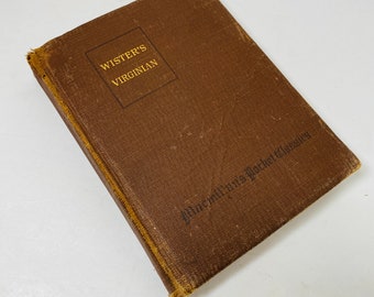 The Virginian vintage book by Owen Wister circa 1921 Horseman of the Plains Western genre cowboy horse-thievery, cattle driving gunfight