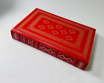 Red And The Black vintage leather book by Stendhal circa 1981 about a man's struggle to succeed despite his meager upbringing.