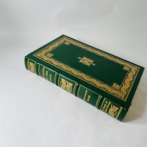 May include: A dark green hardcover book with gold decorative detailing. The spine displays the title "Diseases of the Mind" and the author's name, Benjamin Rush. Part of the Classics of Medicine Library.