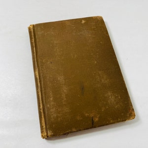 May include: A brown, worn book with the title "The Principles of Active" embossed on the cover.