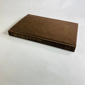 Story of Henri Tod by William F Buckley vintage book circa 1984 set in East Germany. Brown bookshelf decor