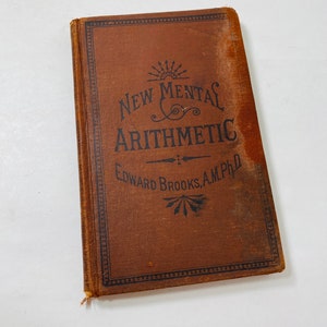 Vintage primary school arithmetic textbook Edward Brooks circa 1923 Elementary school math book decor Academic Depression era Prop staging