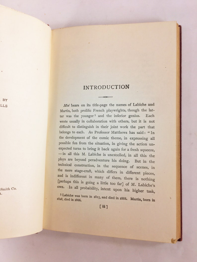 May include: A page from a book titled "Moi" with an introduction about the French playwrights Labiche and Martin. The text discusses their collaboration and individual contributions to their work. The page is printed on white paper with black ink.