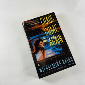 Chaos Come Again by Wilhemina Baird vintage paperback book 1997 about symbiotes in a telepathic evolution. Science fiction female author