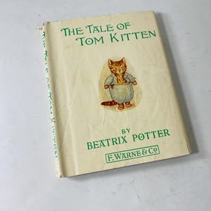 May include: A rustic wooden sign with the text "Welcome to our home" in white lettering. The sign features a distressed finish and a simple, inviting design, perfect for entryway decor.