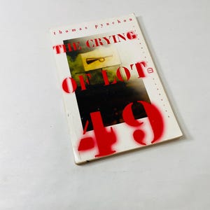 Crying of Lot 49 by Thomas Pynchon Vintage paperback book circa 1999 Conspiracy, alternative history, neurosis and 60s LA suburbia.