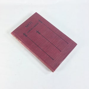 May include: A burgundy book with the title "MOI" and the author "LABICHE ET MARTIN" printed on the spine.