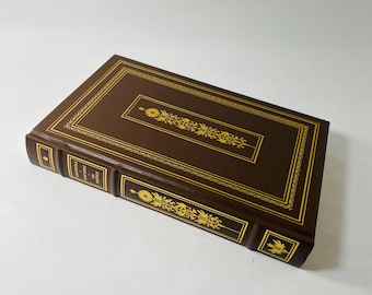 Aristotle Poetics Rhetoric vintage leather book “Courage is the first of human qualities because it is the quality which guarantees others”