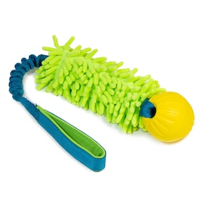 May include: A dog toy with a bright yellow ball and a lime green, textured, cylindrical body. The toy has a teal handle and a teal, stretchy cord. The toy is designed for interactive play and exercise.