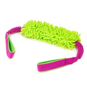 May include: A green and pink dog toy with a long, fluffy, green body and two pink straps. The toy is designed for tugging and fetching.