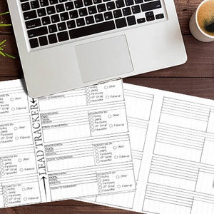 May include: A black and white printable lead tracker sheet with sections for contact information, follow-up, and notes. The sheet is on a wooden table with a laptop, coffee cup, and a notebook.