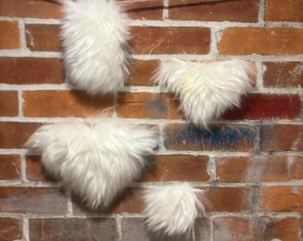 Ambachtelijke vormen witte schapenvacht: echt leer van Woolmark